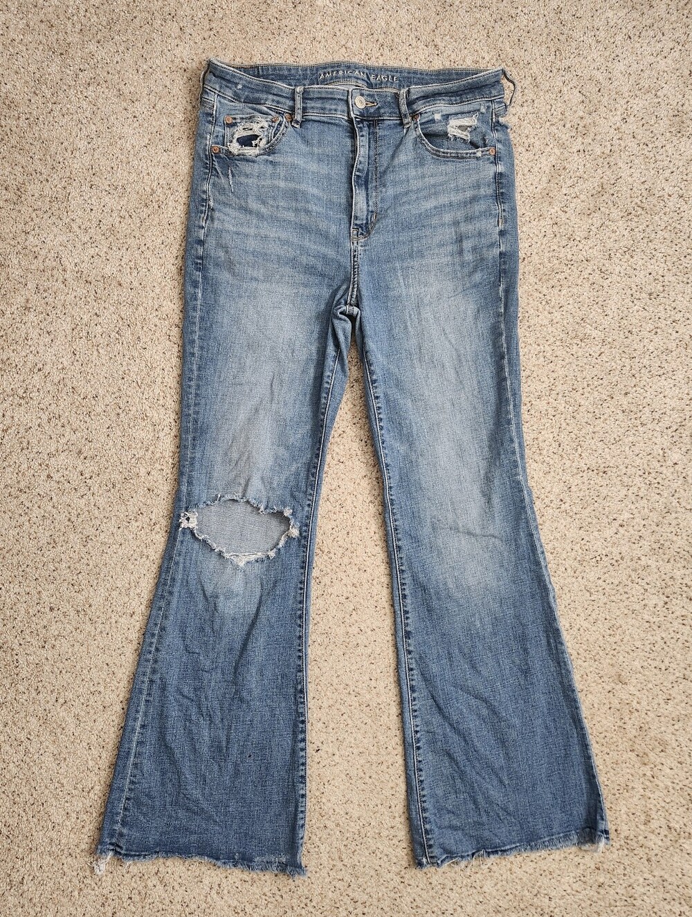 American Eagle Outfitters Super Hi Rise Distressed Flare Jeans